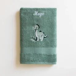 Badhanddoek|Handdoek En Badlaken Kids<Colombine des petits Collectie geborduurd kinderbadlinnen in katoen met dinosaurusmotief, personaliseerbaar - 380 g/m2 eucalyptus