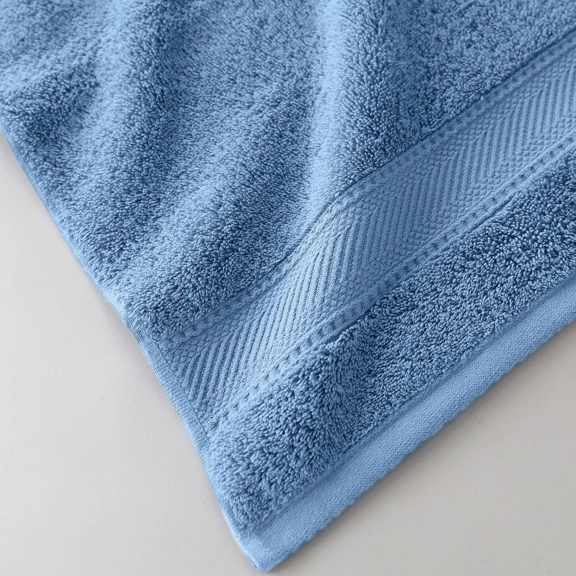 Badhanddoek<Colombine Effen badstof 540g/m2, luxe comfort jeansblauw