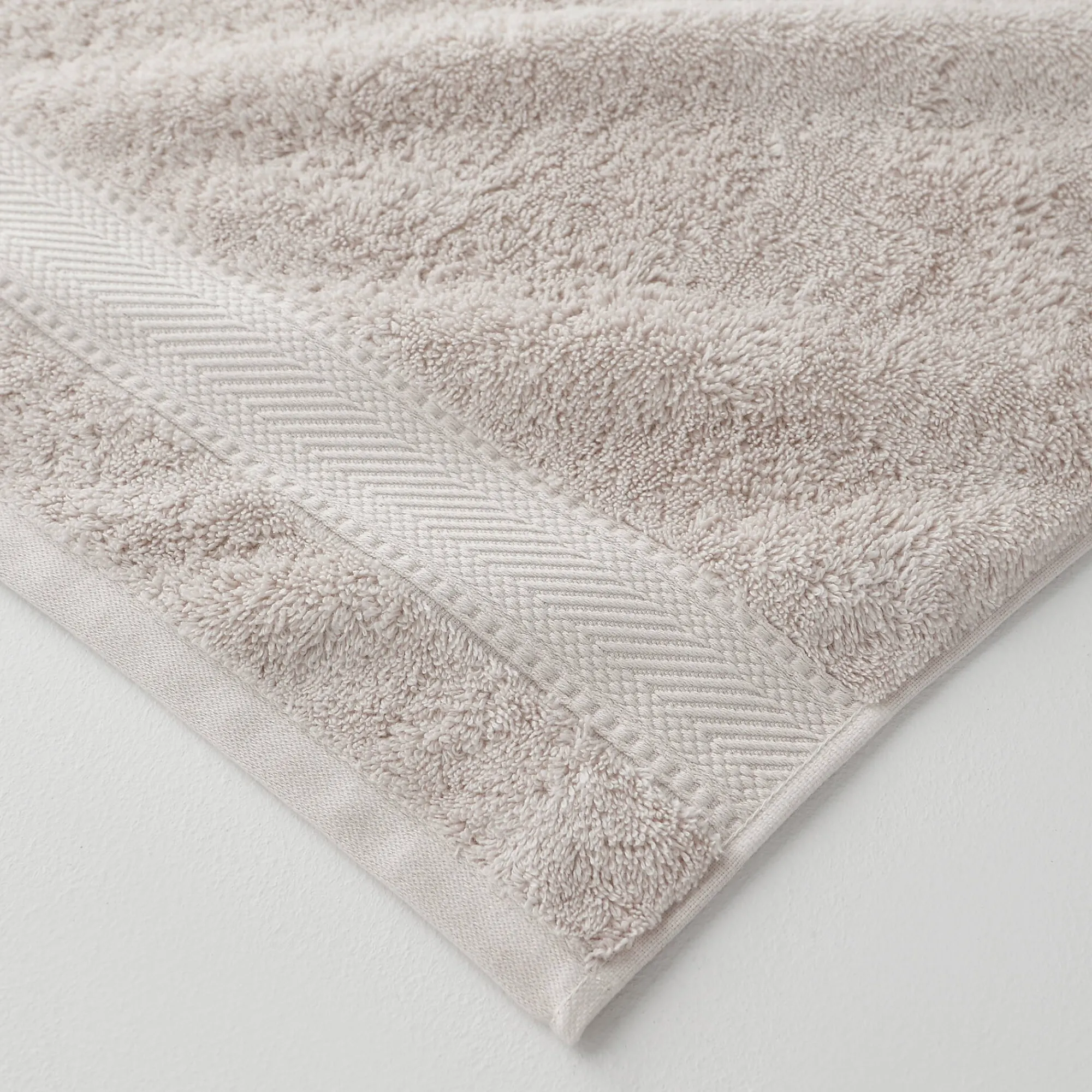 Badhanddoek<Colombine Effen badstof 540g/m2, luxe comfort zandkleur