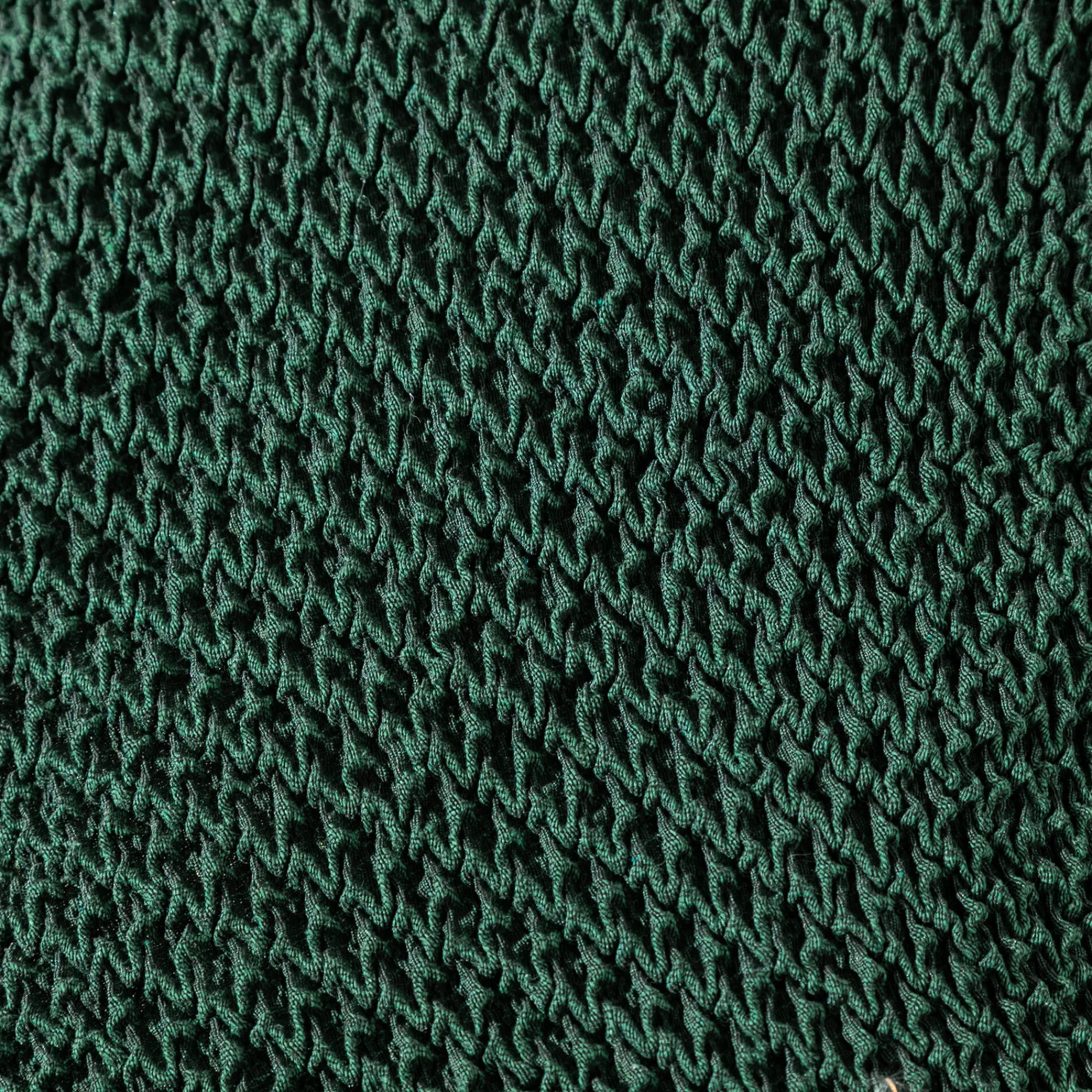 Zitbankhoes<Blancheporte Getextureerde, bi-rekbare hoes voor zitbank en fauteuil met armleuningen groen
