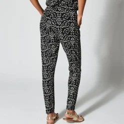 Broek<Blancheporte Nauwsluitende broek in soepel, bedrukt tricot, elastische taille zwart / ecru