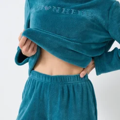 Pyjama<Blancheporte Pyjama in fleece met 'bonheur' borduursel, lange mouwen eendenblauw