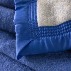 Deken<Ourson Tweekleurig deken in wol 600g/m2 blauw